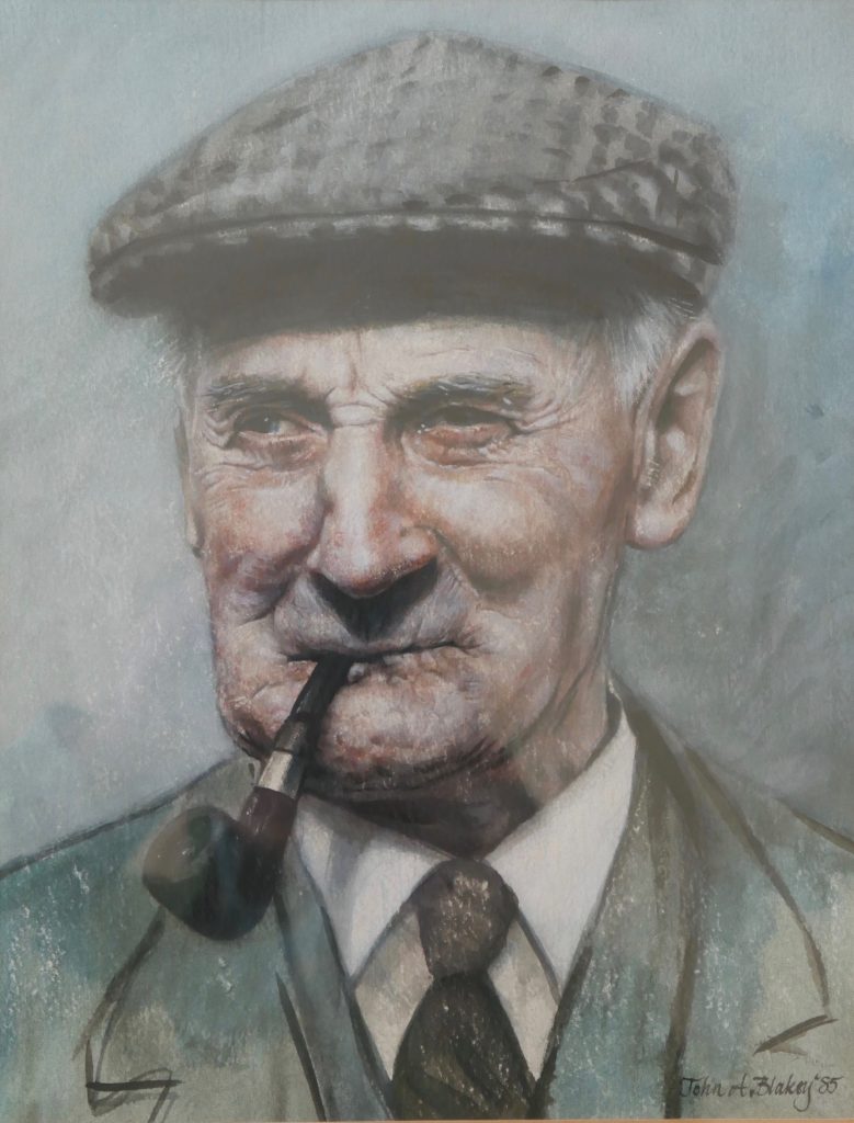 Portrait of an elderly gentleman wearing a flat cap